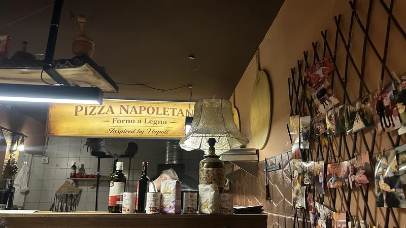The lit Pizza Napoletana – Forno a Legna – Inspired by Napoli sign over the counter